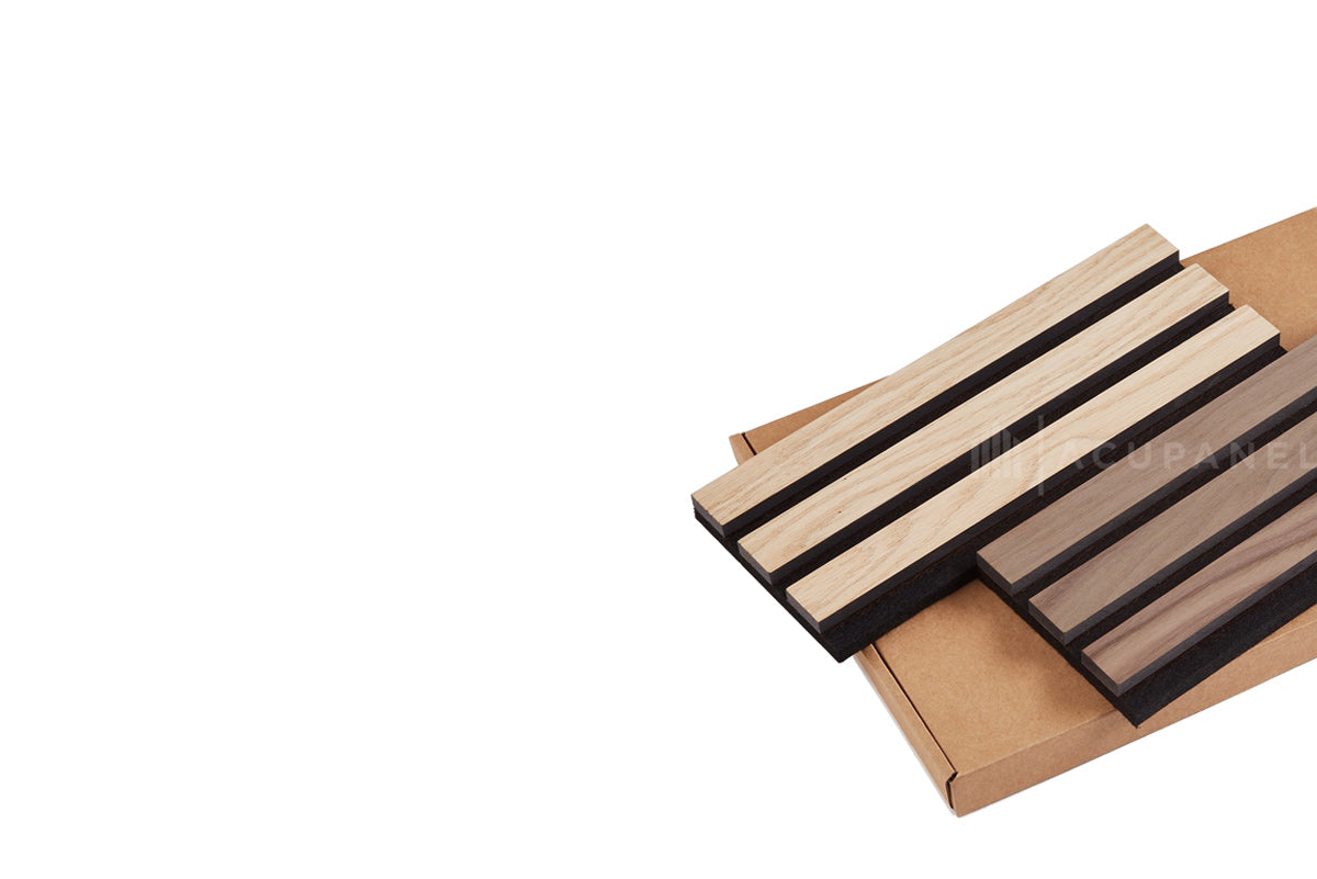 Acoustic slat panel sample box including smoked oak, natural oak, walnut and oak with a grey felt backing.
